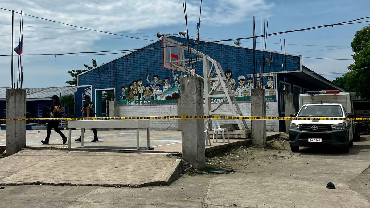 Two teenage students arrested after opening fire at Philippine high school, killing three classmates