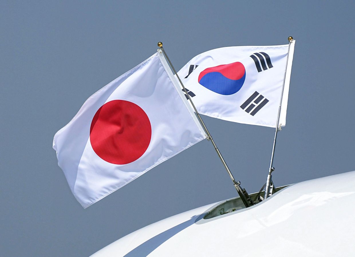 Nuclear dominoes in Asia: how one country's weapons ambitions could trigger regional cascade